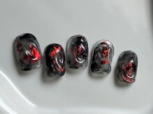 つめノさき/黒と赤ホイルネイル