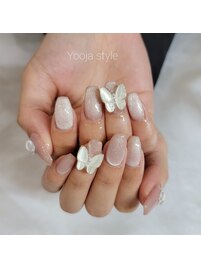 蝶々とピクシーキラキラネイル