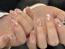 ブラソンネイル(Blossom nail)/ときめきゴールドのリボンネイル