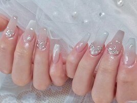 ワンホンネイル　担当西村