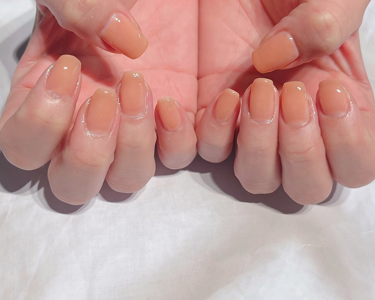 2025年-2026年冬トレンド】オレンジ オフィス ハンドのネイルデザイン