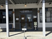 メロロココネイル(Melo Rococo)の雰囲気（建物入り口です。階段から2階にお越しください。）