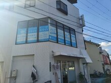 スマイルホワイト/二階でお待ちしております