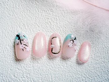 春を纏うバイカラーの桜ネイル