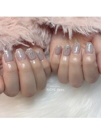 くすみピンクのリボンネイル