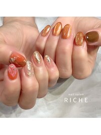 秋オレンジのニュアンスネイル