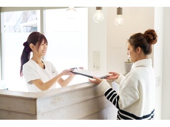 トラスト整体院 小池院/受付・カウンセリングシート記入