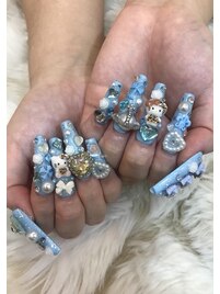 水色キラキラロングネイル