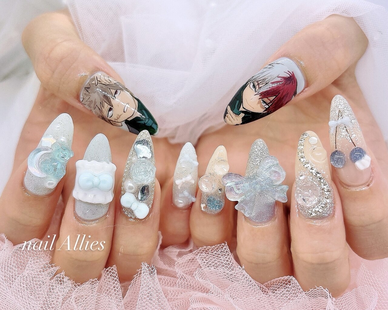 2025年-2026年冬トレンド】ブルー リボン ハンドのネイルデザイン集