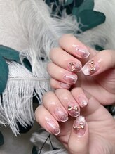 ウブントゥ(Ubuntu)/ラメ×リボンの大人可愛いネイル