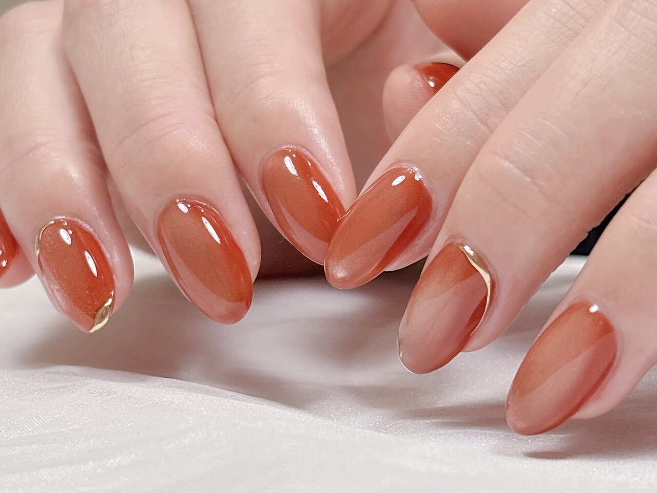 2025年-2026年冬トレンド】ニュアンス オレンジのネイルデザイン集
