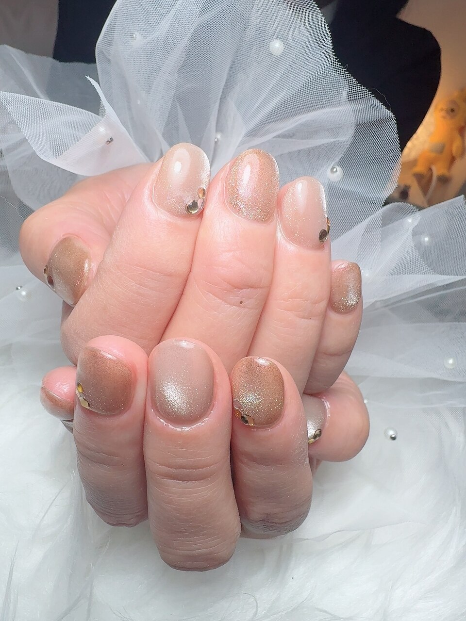 2025年-2026年冬トレンド】オレンジベージュのネイルデザイン集｜人気