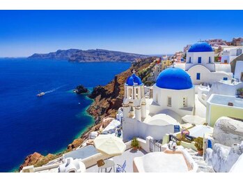 リゾートサロン プレミア 草薙店/サントリーニ島イメージの店内