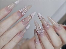 長さだしガーリーネイル豊富のリボンパーツ