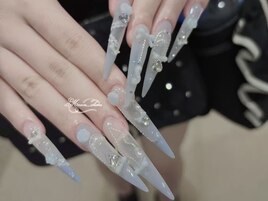水色リボン彩る上品ロングネイル