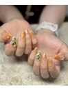 オレンジキラキラネイル