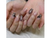 透け感のあるチェックにリボンを合わせた大人かわいいデザイン