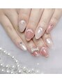 アールズネイル(R's Nail) 大人可愛いピンクネイルにリボンパーツとパールで華やかに