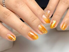 透け感オレンジネイル