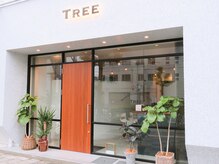 ビューティー トリートメント サロンツリー(Beauty treatment salon TREE)の雰囲気（TREEの外観/外壁はビアンコカララ、ロゴはLEDバックチャンネル）