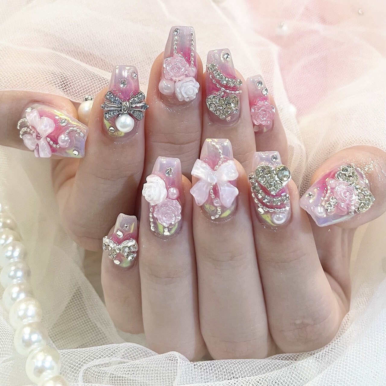 2025年-2026年冬トレンド】オーロラピンクのネイルデザイン集｜人気順