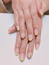 ネイルアンドまつげエクステ専門サロン スリー(THREE)/黄色フレンチ+お花