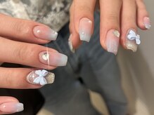 ノラネイル ウメダ(NORA nail UMEDA)/水色リボンキラキラネイル