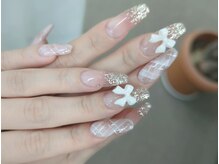 ネイルパキラ(nail pachira)/春チェック＋リボンチャーム
