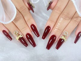 赤系ネイル　長さだし　リボン