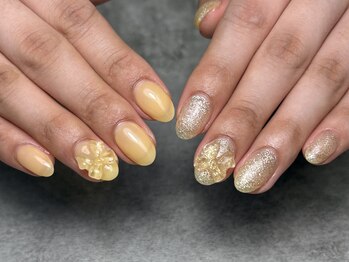 春カラーのリボンがポイント