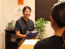 整体院 レベルアップの雰囲気（カウンセリング。不調やお悩みを丁寧に確認します。）