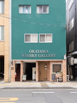 アクアバリ(AQUA BALI)/緑色のビル2階