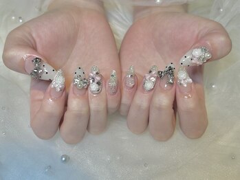 ぷりゅねる 心斎橋/【リボンとバラガーリーネイル】