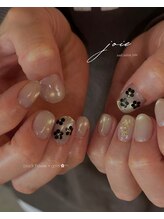 black flower × gold