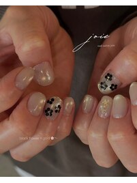 black flower × gold