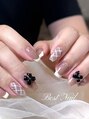 ベストネイル 渋谷109前店(Best Nail) ベージュベースにホワイトチェックとリボン、可愛らしくオシャレ