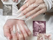 レリュクスネイル(le luxe nails)の雰囲気（上品ホワイトリボン×ちゅるん艶感で魅せる清楚系ロングネイル）