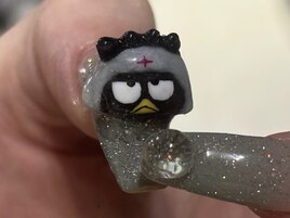 寝そべりバツ丸