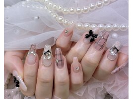 チェックネイル 黒リボン