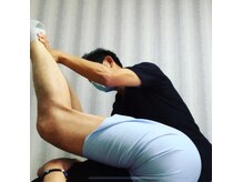 正常可動範囲テストでの仰臥位前屈動作