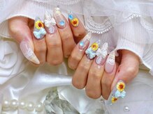 チェック×ひまわりネイル