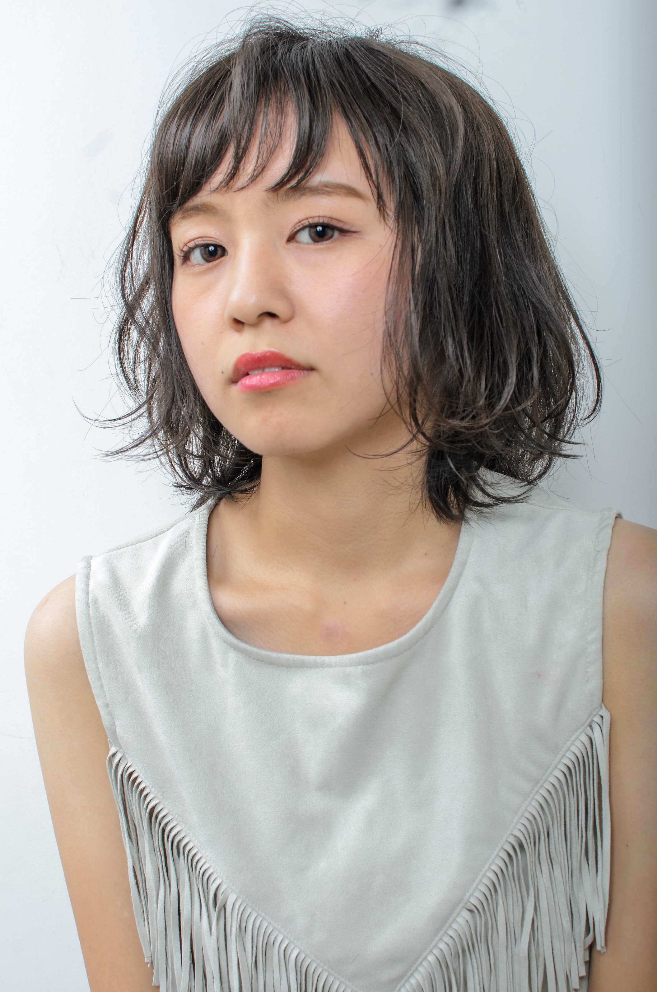 ふわっと弾む質感が可愛い、ラフなガーリーヘアー