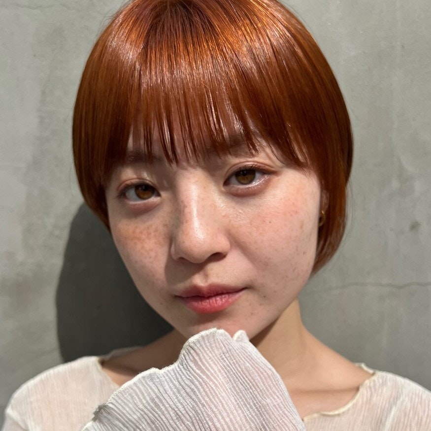 オレンジってどんな髪色？ブリーチの必要性と7つのオレンジ系ヘアカラー見本集のサムネイル画像