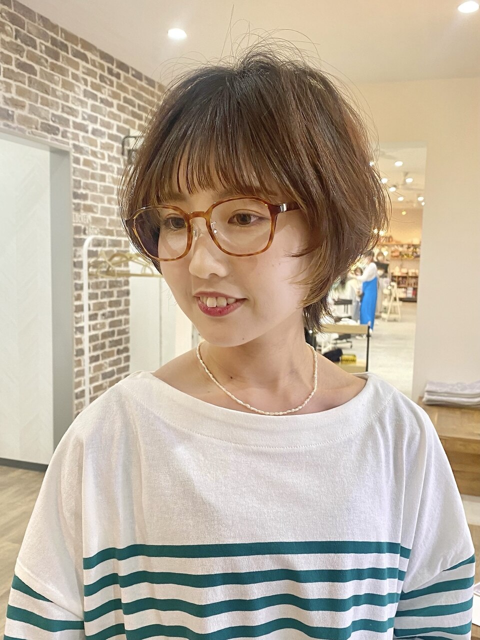 笑顔を彩るショートウルフ