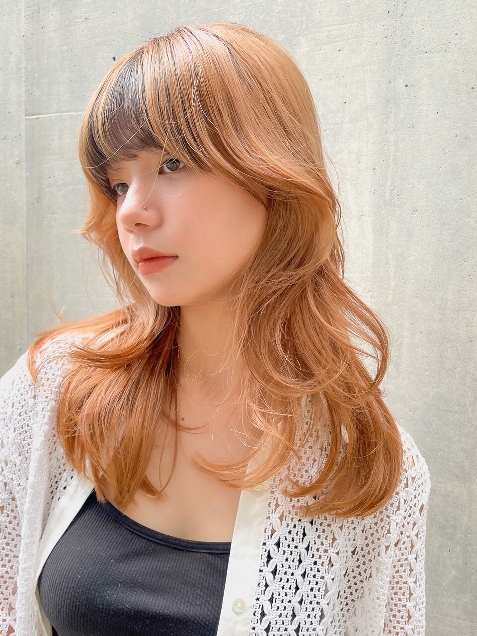 韓国風くびれヘアにエッジを効かせたオレンジヘア