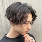 波打ちスパイラルパーマセンターパートツーブロック束感