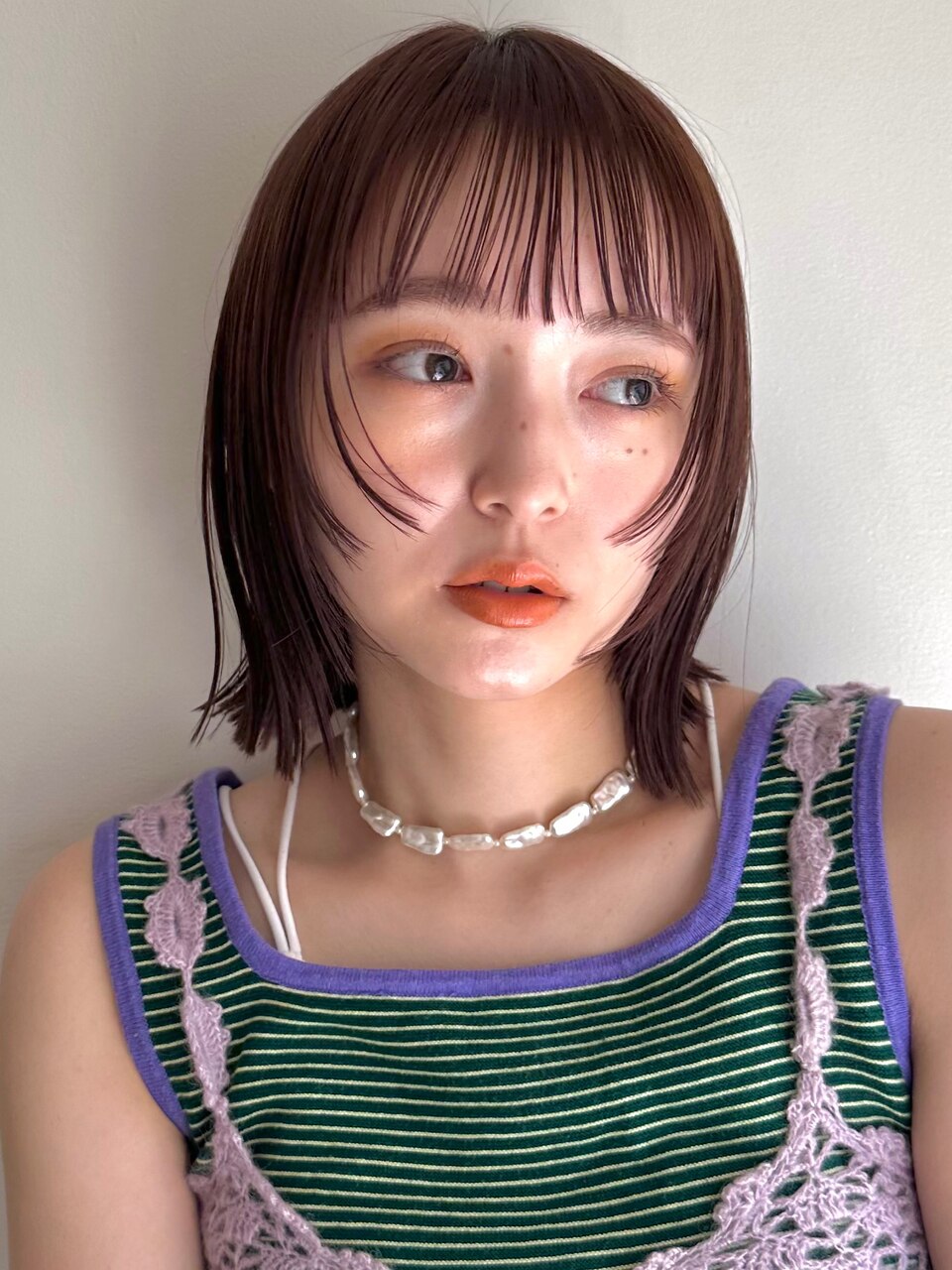 コテ巻きアレンジも可愛い♪大人気のぷつっとボブ